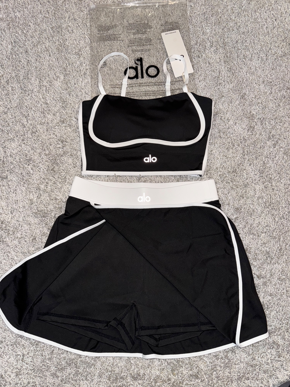 ALO Yoga Black Sports Bra and Skirt Set with White Trim
